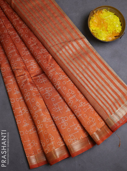 Semi raw silk saree rustic orange with allover geometric prints and zari woven border