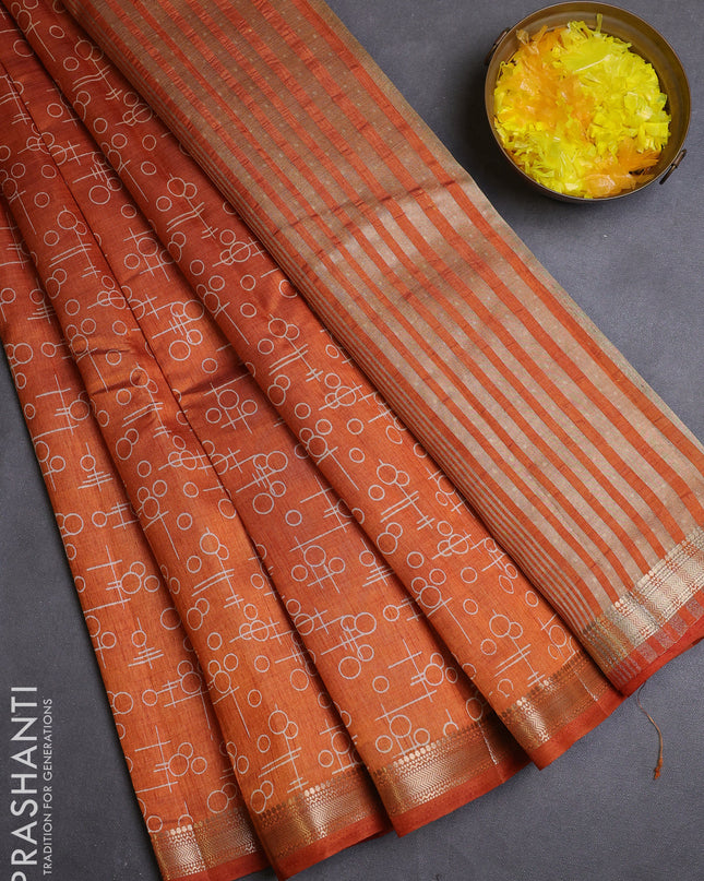 Semi raw silk saree rustic orange with allover geometric prints and zari woven border