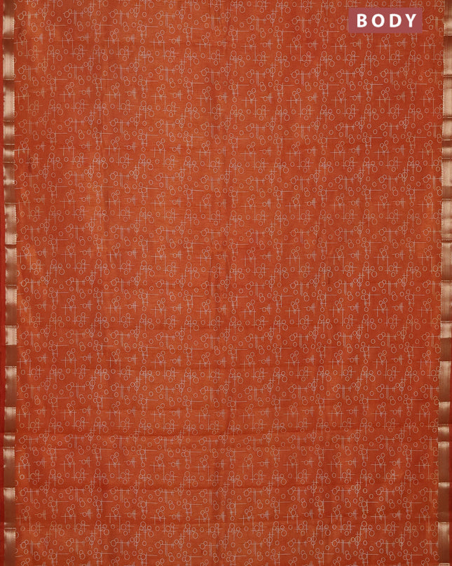 Semi raw silk saree rustic orange with allover geometric prints and zari woven border
