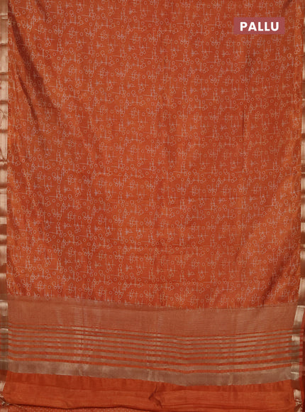 Semi raw silk saree rustic orange with allover geometric prints and zari woven border