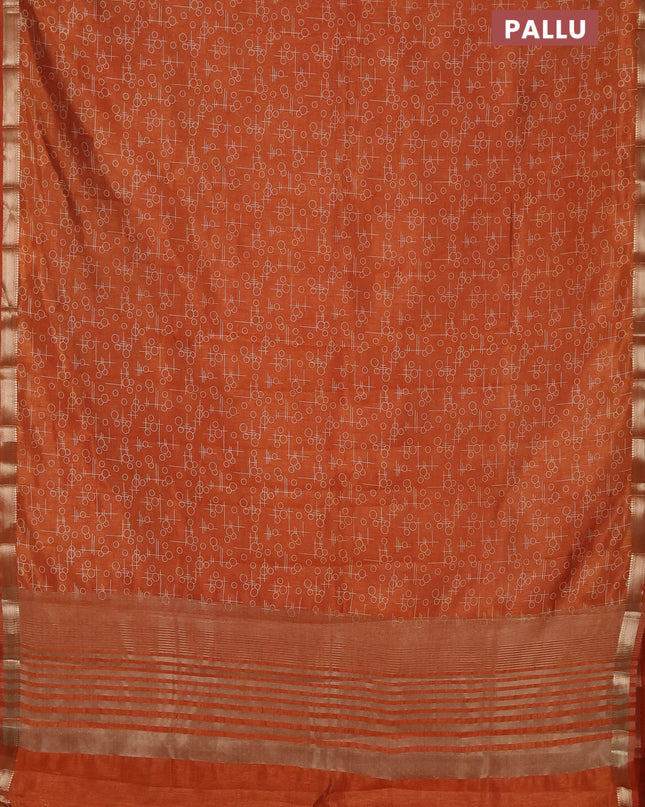 Semi raw silk saree rustic orange with allover geometric prints and zari woven border