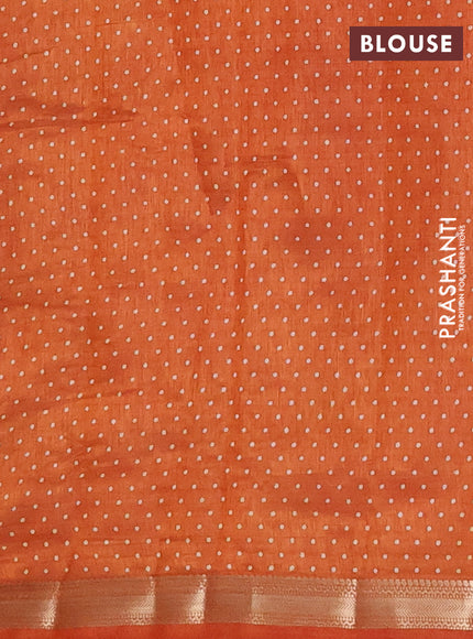 Semi raw silk saree rustic orange with allover geometric prints and zari woven border