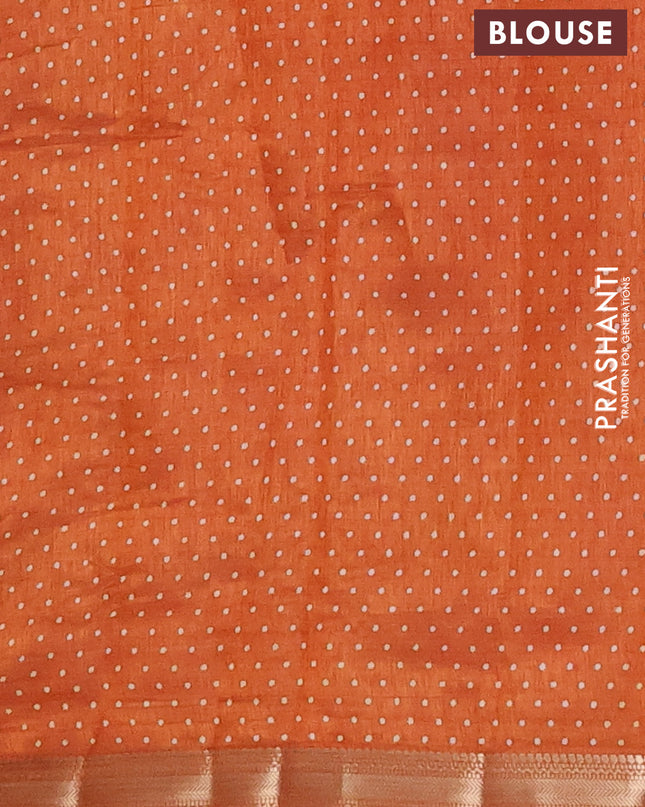 Semi raw silk saree rustic orange with allover geometric prints and zari woven border
