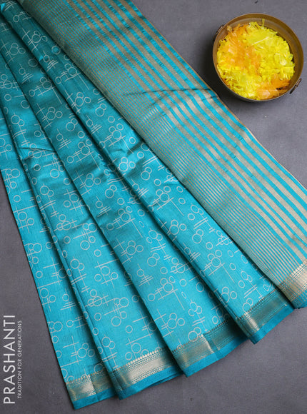 Semi raw silk saree teal blue with allover geometric prints and zari woven border