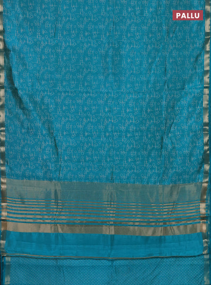 Semi raw silk saree teal blue with allover geometric prints and zari woven border