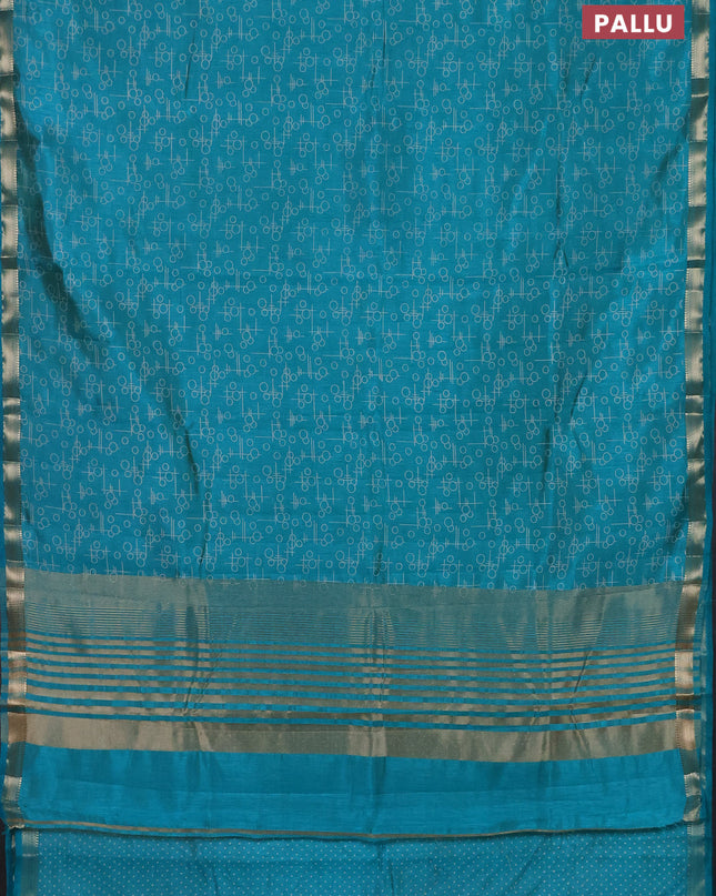Semi raw silk saree teal blue with allover geometric prints and zari woven border