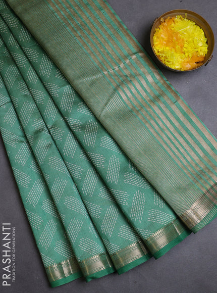 Semi raw silk saree pastel green with allover geometric butta prints and zari woven border