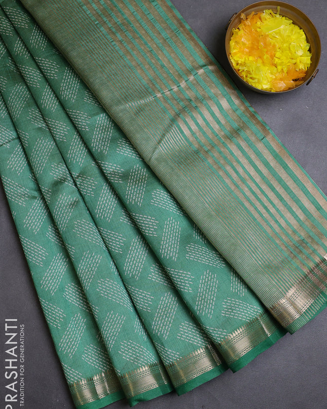 Semi raw silk saree pastel green with allover geometric butta prints and zari woven border