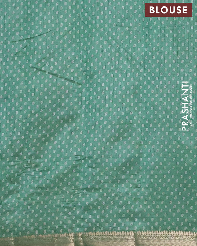 Semi raw silk saree pastel green with allover geometric butta prints and zari woven border