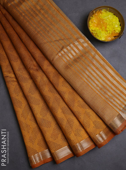 Semi raw silk saree dark mustard with allover geometric butta prints and zari woven border