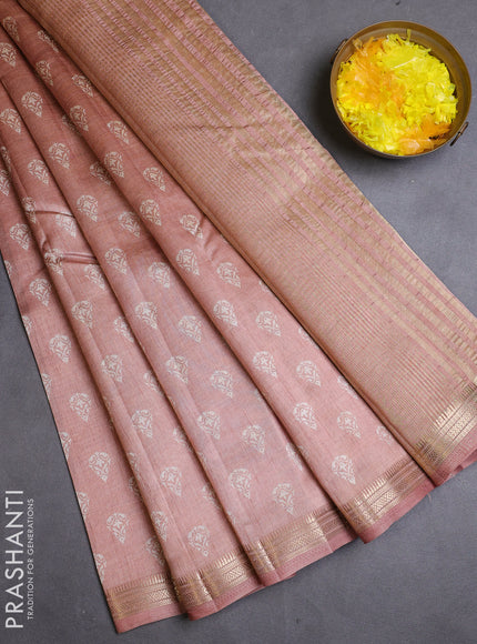 Semi raw silk saree pastel peach with allover butta prints and zari woven border