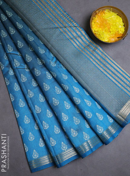 Semi raw silk saree cs blue with allover butta prints and zari woven border