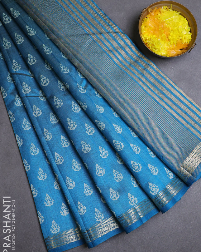 Semi raw silk saree cs blue with allover butta prints and zari woven border