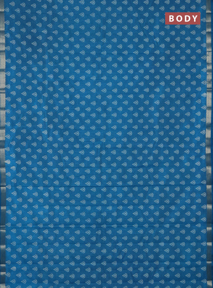 Semi raw silk saree cs blue with allover butta prints and zari woven border