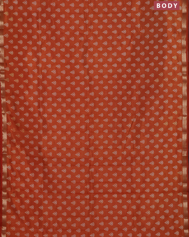 Semi raw silk saree rustic orange with allover butta prints and zari woven border