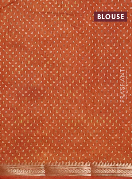 Semi raw silk saree rustic orange with allover butta prints and zari woven border