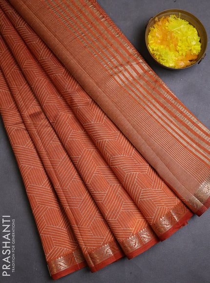 Semi raw silk saree rustic orange with allover geometric prints and zari woven border