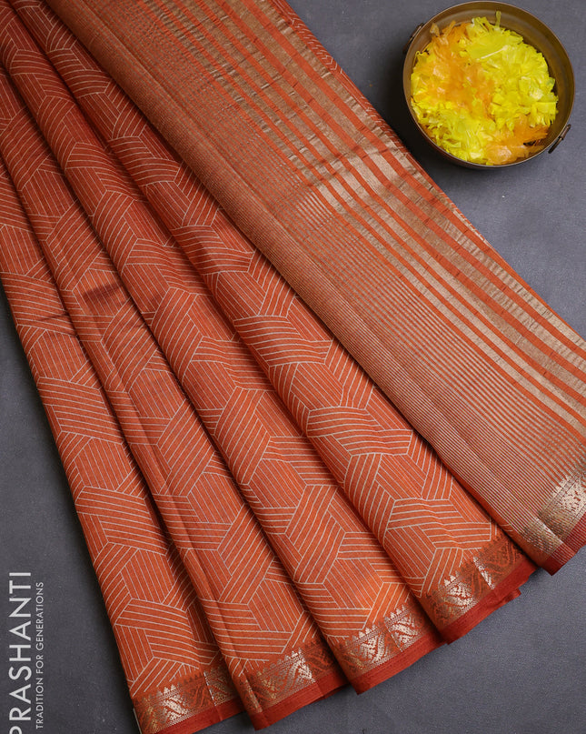 Semi raw silk saree rustic orange with allover geometric prints and zari woven border
