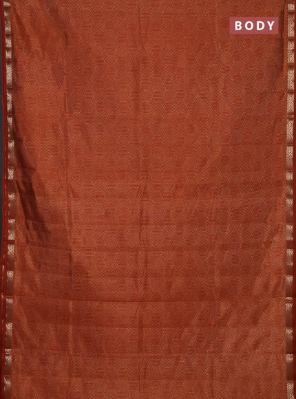 Semi raw silk saree rustic orange with allover geometric prints and zari woven border