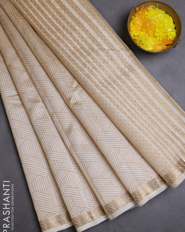 Semi raw silk saree cream with allover geometric prints and zari woven border