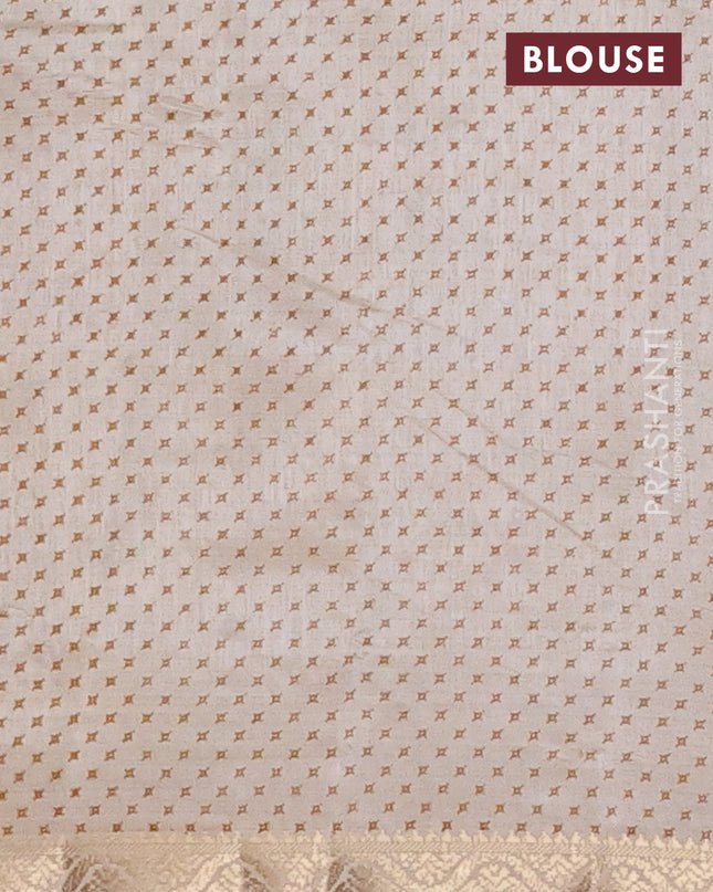 Semi raw silk saree cream with allover geometric prints and zari woven border