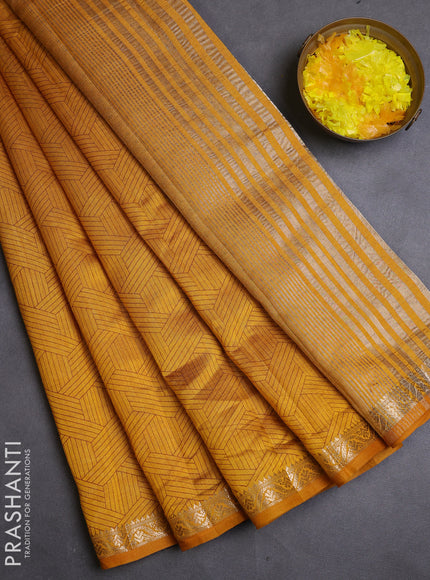 Semi raw silk saree dark mustard with allover geometric prints and zari woven border