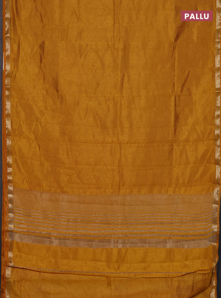 Semi raw silk saree dark mustard with allover geometric prints and zari woven border