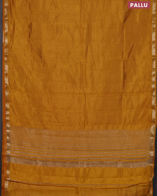 Semi raw silk saree dark mustard with allover geometric prints and zari woven border