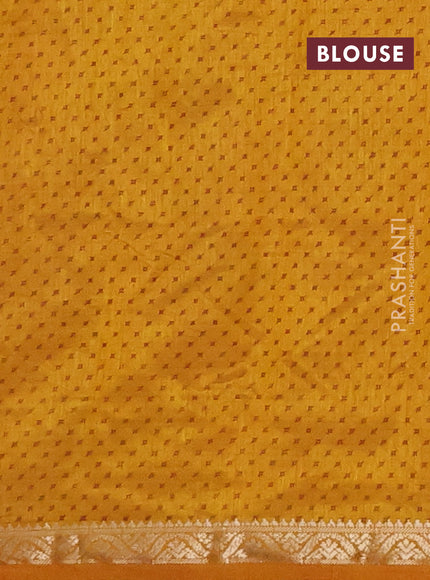 Semi raw silk saree dark mustard with allover geometric prints and zari woven border