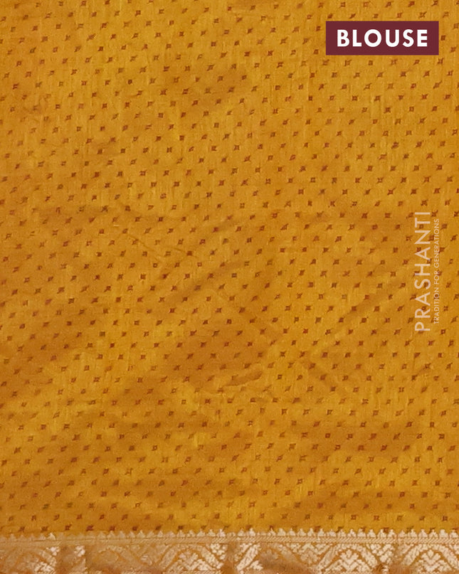 Semi raw silk saree dark mustard with allover geometric prints and zari woven border