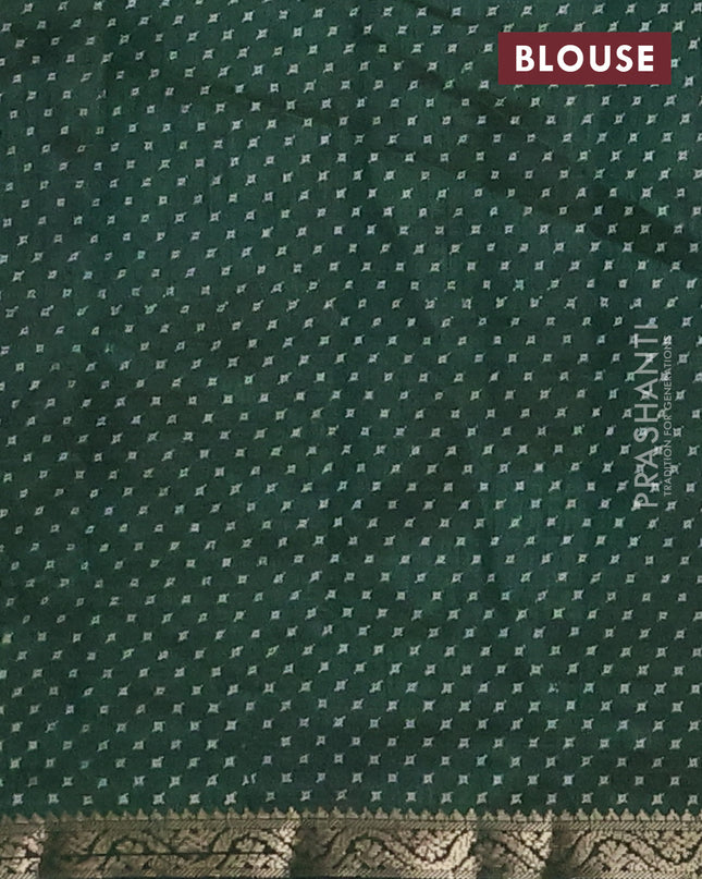 Semi raw silk saree bottle green with allover geometric prints and zari woven border