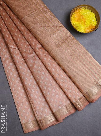 Semi raw silk saree pastel peach with allover butta prints and zari woven border
