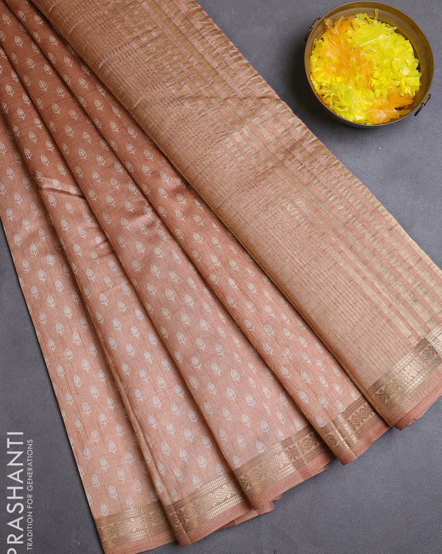 Semi raw silk saree pastel peach with allover butta prints and zari woven border