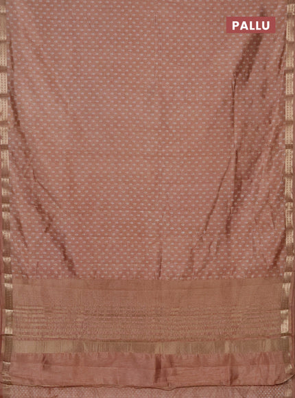 Semi raw silk saree pastel peach with allover butta prints and zari woven border