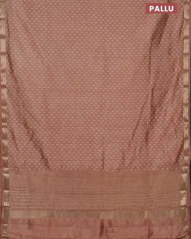 Semi raw silk saree pastel peach with allover butta prints and zari woven border