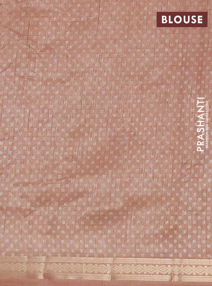Semi raw silk saree pastel peach with allover butta prints and zari woven border