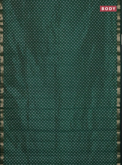 Semi raw silk saree bottle green with allover butta prints and zari woven border