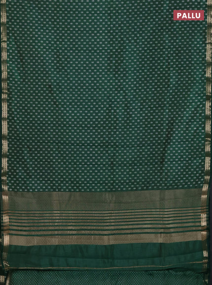 Semi raw silk saree bottle green with allover butta prints and zari woven border