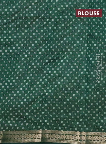Semi raw silk saree bottle green with allover butta prints and zari woven border