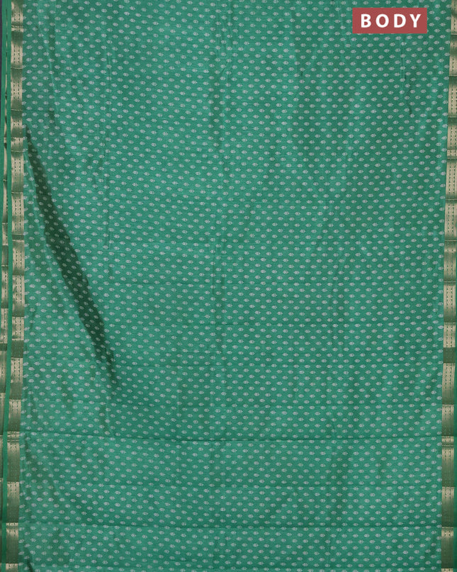 Semi raw silk saree teal green with allover butta prints and zari woven border