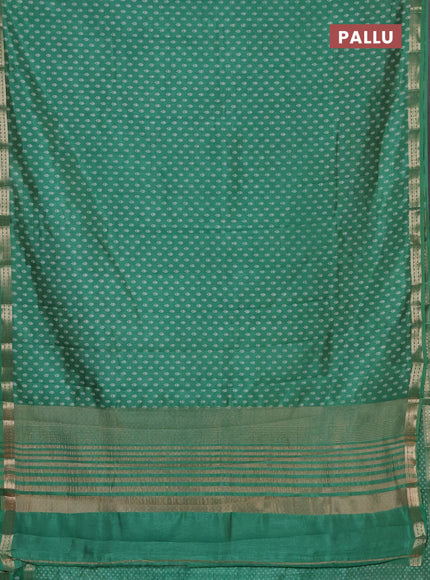 Semi raw silk saree teal green with allover butta prints and zari woven border