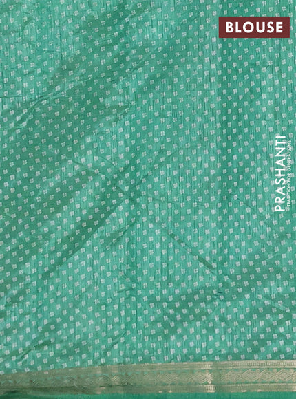 Semi raw silk saree teal green with allover butta prints and zari woven border