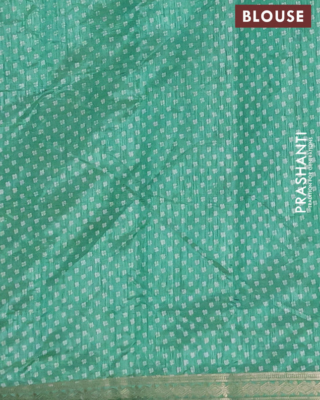 Semi raw silk saree teal green with allover butta prints and zari woven border