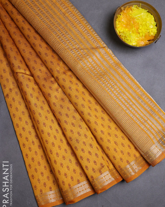 Semi raw silk saree dark mustard with allover butta prints and zari woven border