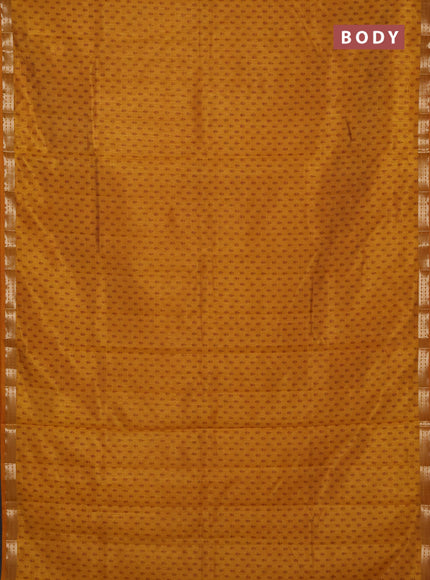 Semi raw silk saree dark mustard with allover butta prints and zari woven border