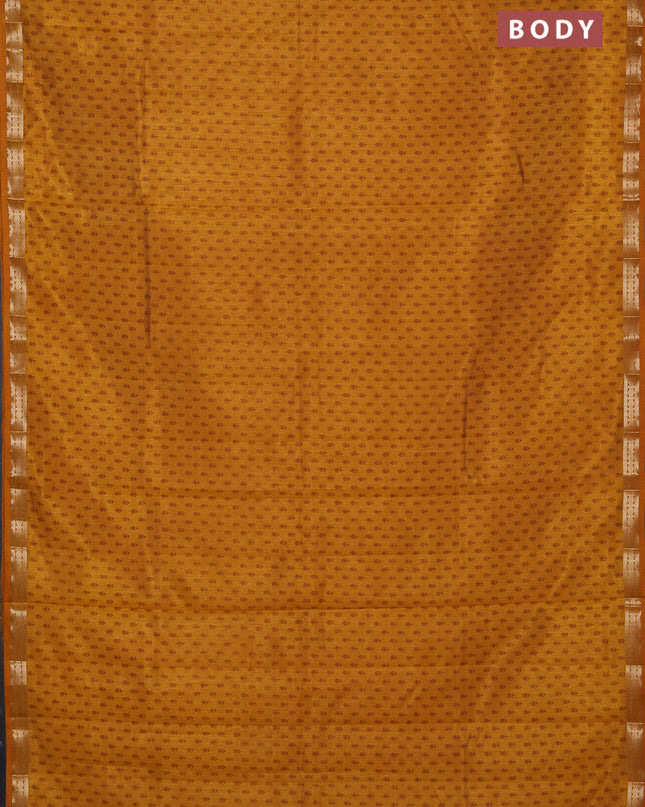 Semi raw silk saree dark mustard with allover butta prints and zari woven border