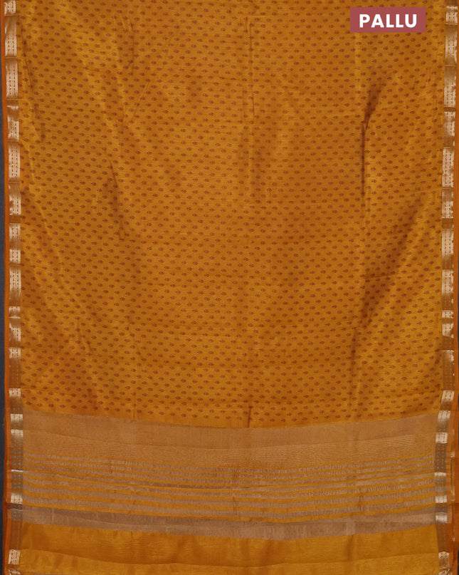 Semi raw silk saree dark mustard with allover butta prints and zari woven border