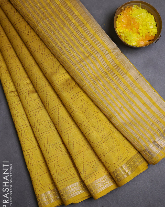 Semi raw silk saree mustard yellow with allover geometric prints and zari woven border