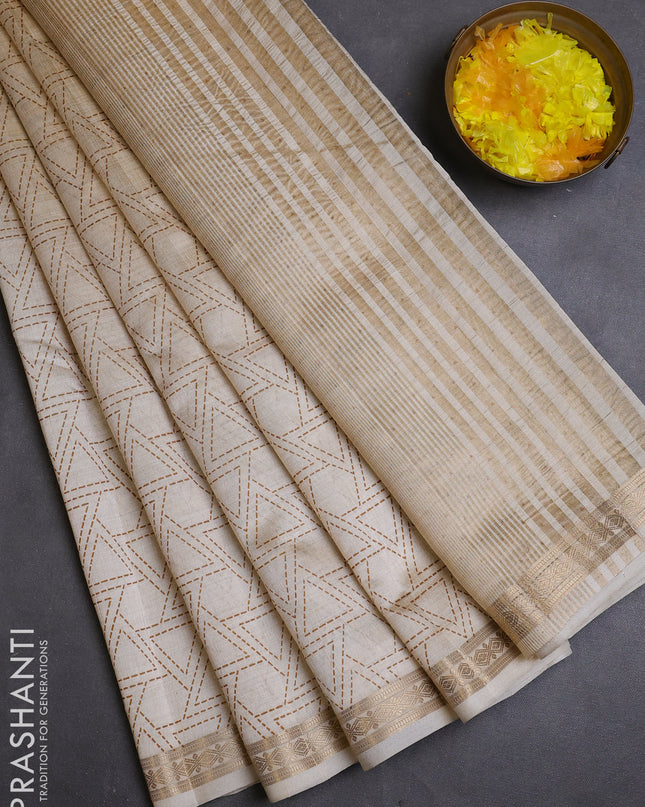 Semi raw silk saree cream with allover geometric prints and zari woven border