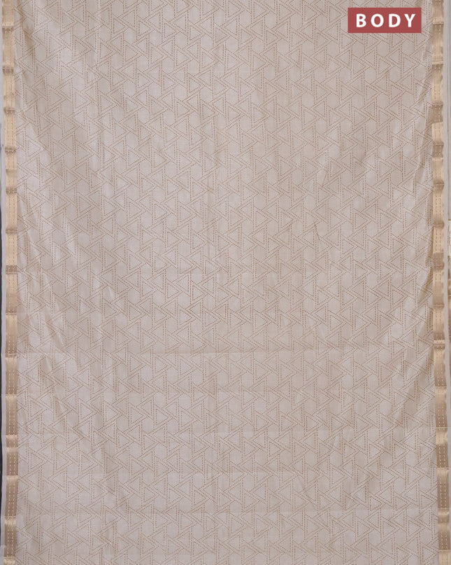 Semi raw silk saree cream with allover geometric prints and zari woven border